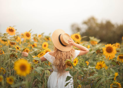 Girl Running Through a Field